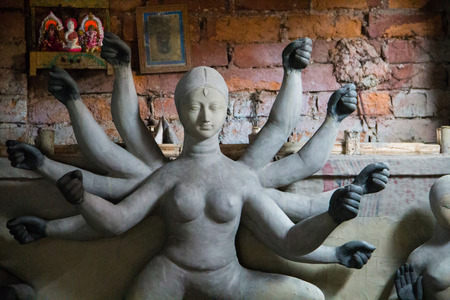 Kumartuli,West Bengal, India, July 2018. A clay idol of Goddess Durga under construction at a shop. Durga puja is the most awaited hindu festival in eastern India and worldwide.のeditorial素材