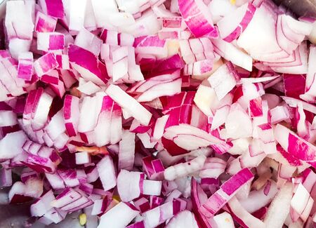 close up macro view of finely minced and chopped onionsの写真素材