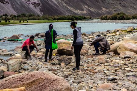 27-June 2016, Ladakh India, Tourist resting on Lidder river of anatnag district of Jammu and...