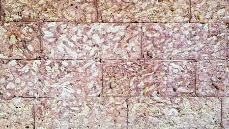 brick pattern red concrete wall stone texture backgroundの写真素材
