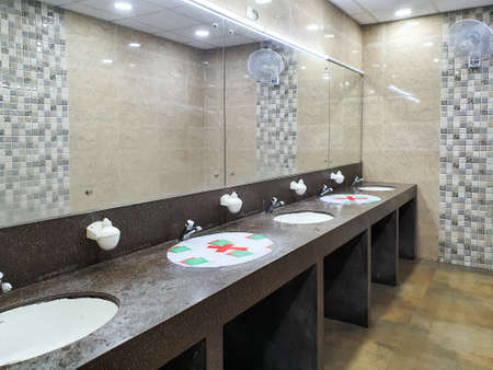 6th June 2020- Bagdogra Airport,Siliguri, West Bengal,India - Adjacent wash basins blocked in toilet to maintain social distancing at Bagdogra Arport.のeditorial素材