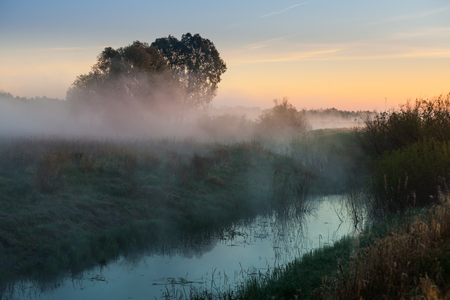 the mist over the River at dawnの写真素材