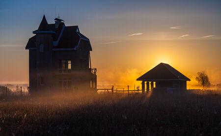 The mysterious house in foggy morning    1の写真素材
