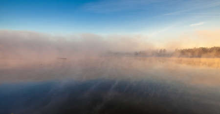 the mist over the River at dawnの写真素材