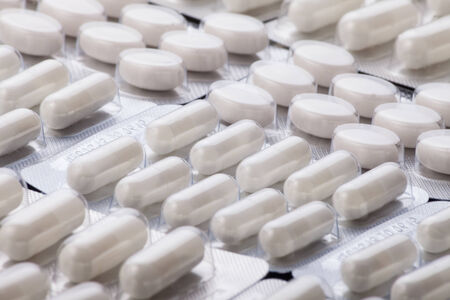 Pharmacy theme, Heap of white round medicine tablet antibiotic pills
