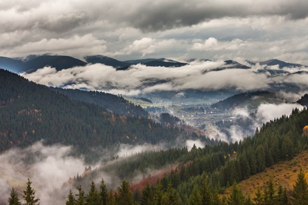 global warming. mountain landscape. Clouds and fog.の写真素材