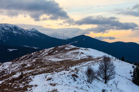 Winter snow covered mountain peaks in Europe. Great place for winter sportsの写真素材