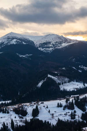 Winter snow covered mountain peaks in Europe. Great place for winter sportsの写真素材