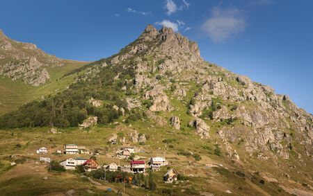 Mountain houses with clouds in Ayder Plateau, Rize, Turkey.の写真素材