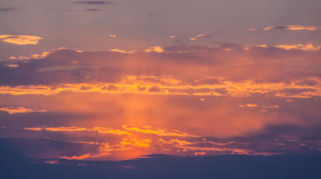 Scenic orange sunset sky background.