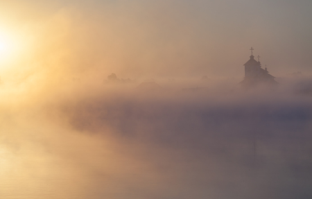 Beautiful sunrise over Church. Ukraineの写真素材