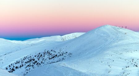 Colorful winter sunrise in the mountains.の写真素材