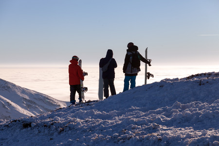 Group or team concept with friends skiers and snowboarders. ski  snowboard resort.の写真素材