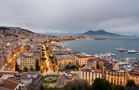 Naples, Italy. Evening city car traffic and the sea bayの写真素材