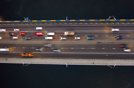 Rising drone shot reveals spectacular elevated highway, bridges, transportationの写真素材