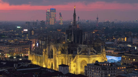 Aerial view of the central spire of the duomo and the citys cathedral at sunset. Milan. Italyの写真素材