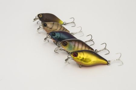 Hard baits lure like a fishing plugs or wobblers for freshwater fishing, that imitate baitfish, with a short fat body, on a uniforの写真素材