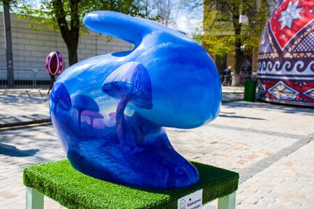 Figure of Easter bunny in psychedelic blue color with painted blue mushrooms on it. Beautiful Easter art decoration .Kyiv (Kiev), Ukraine, april 2018のeditorial素材