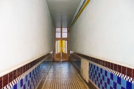 Stained glass doors and 20 century tile in the entryway of the old Austro-Hungarian residential...