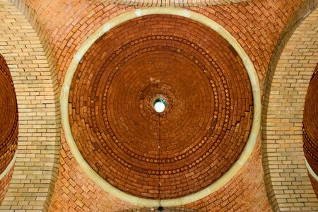 Domed vault ceiling with lamp on center of circle near main entry in main building of University.  Architecture of Chernivtsi National Universityのeditorial素材