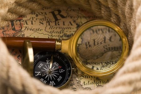Old compass on map