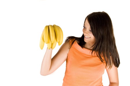 Young girl with fruitsの写真素材