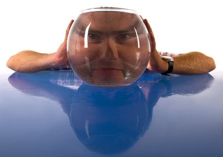 A funny situation with a smart man and Aquariumの写真素材