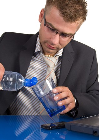 Businessman working at his deskの写真素材