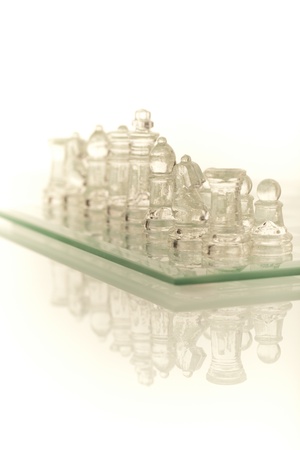 Beautiful glass chess on a white background.の写真素材