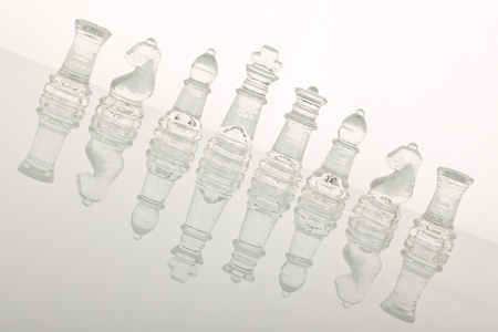 Beautiful glass chess on a glass countertop.の写真素材