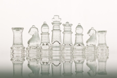 Beautiful glass chess on a glass countertop.の写真素材