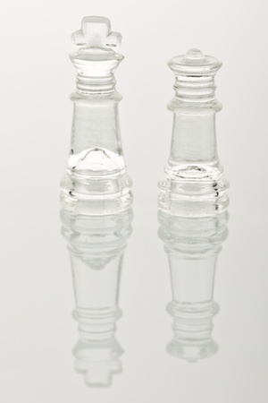 Beautiful glass chess on a glass countertop.の写真素材