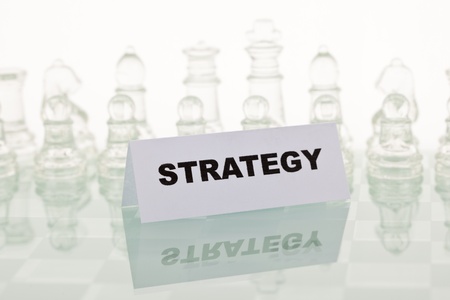 The concept of a good strategy. Beautiful glass chess on a white background.の写真素材