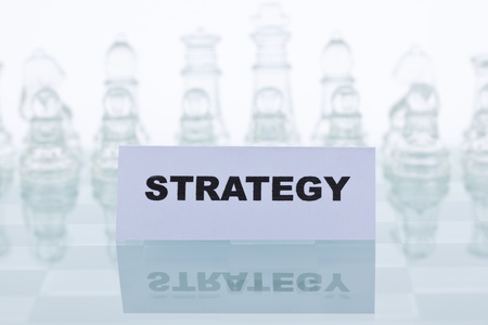 The concept of a good strategy. Beautiful glass chess on a white background.の写真素材