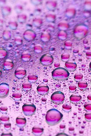 The stamp envelopes placed inside a water dropletの写真素材