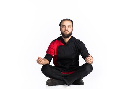 Chef sitting Yoga. Lotus Position. white backgroundの写真素材