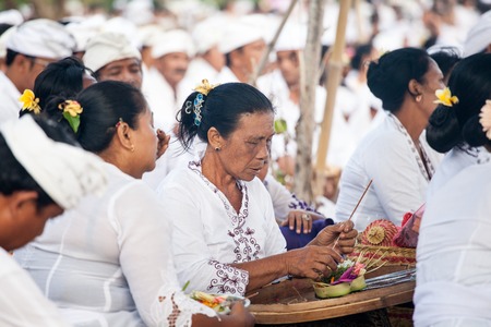 BALI, Indonesia - MAR 9, 2013: Local people during performed Melasti Ritual. Melasti is a Hindu Balinese purification ceremony and ritual is held several days prior to the Nyepi holy day.のeditorial素材