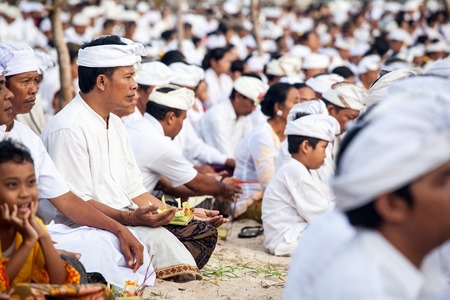 BALI, Indonesia - MAR 9, 2013: Local people during performed Melasti Ritual. Melasti is a Hindu Balinese purification ceremony and ritual is held several days prior to the Nyepi holy day.のeditorial素材