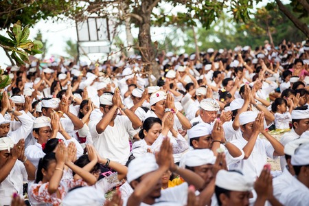 BALI, Indonesia - MAR 9, 2013: Local people during performed Melasti Ritual. Melasti is a Hindu Balinese purification ceremony and ritual is held several days prior to the Nyepi holy day.のeditorial素材