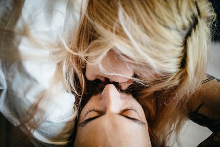 Close up portrait of a sexy young couple kissing.