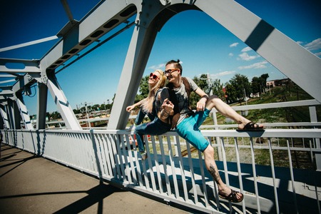 Hipster couple in summer sunny day. Summer mood ,wearing sunglasses.の写真素材
