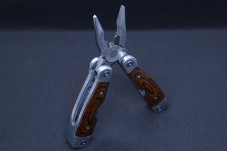 Multi tool black color with black background