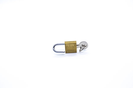 Key inside padlock on white background.