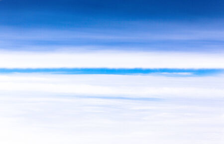 Boundary zone between a sea of clouds and the upper cloudy skyの写真素材