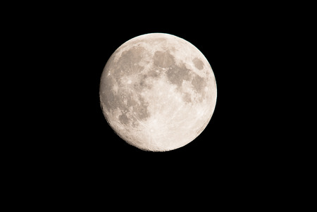 Full moon in the sky at nightの写真素材