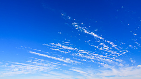 Linear clouds in the blue wide skyの写真素材