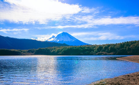 Lake Saiko and Mount Fuji, bright cloudsの写真素材