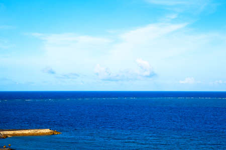 Clouds and blue oceanの写真素材