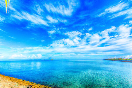 Clouds and blue ocean, tropical islandの写真素材