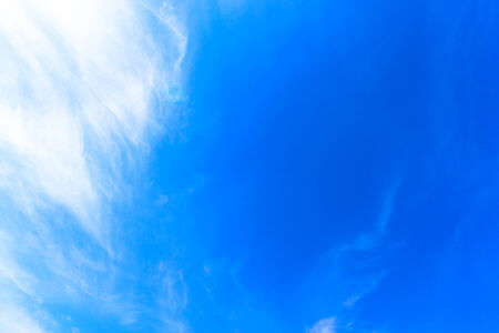 Blue sky, white clouds and sunshine in Okinawa summerの写真素材